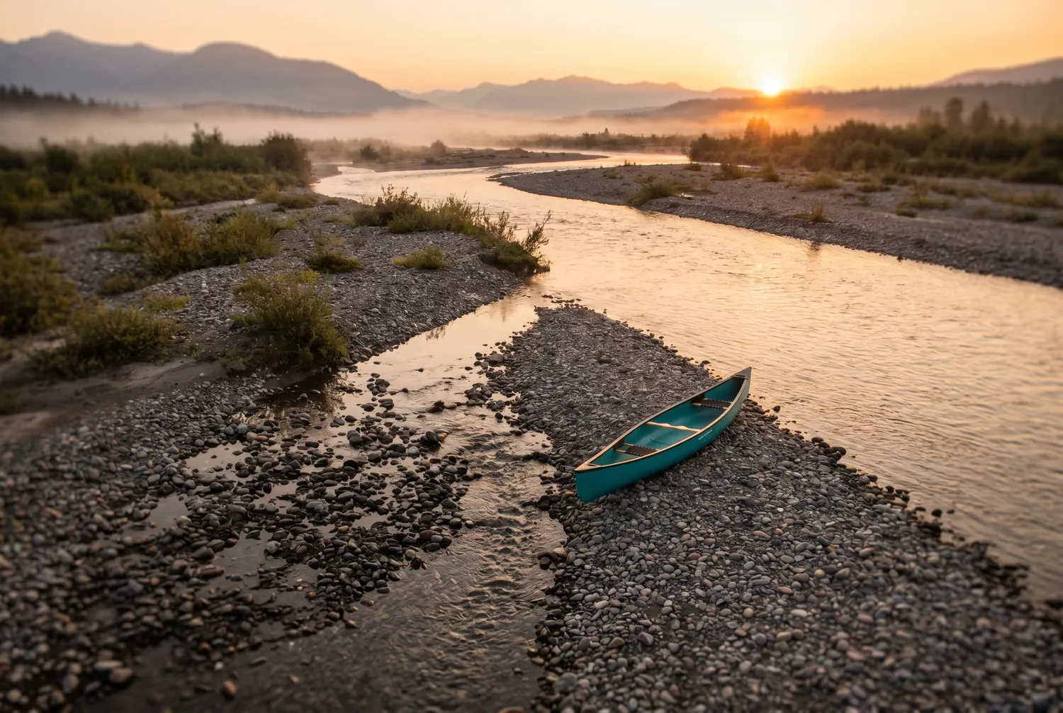 Braided river carving a new channel beside an established one, with a single teal canoe resting on the gravel bar between them