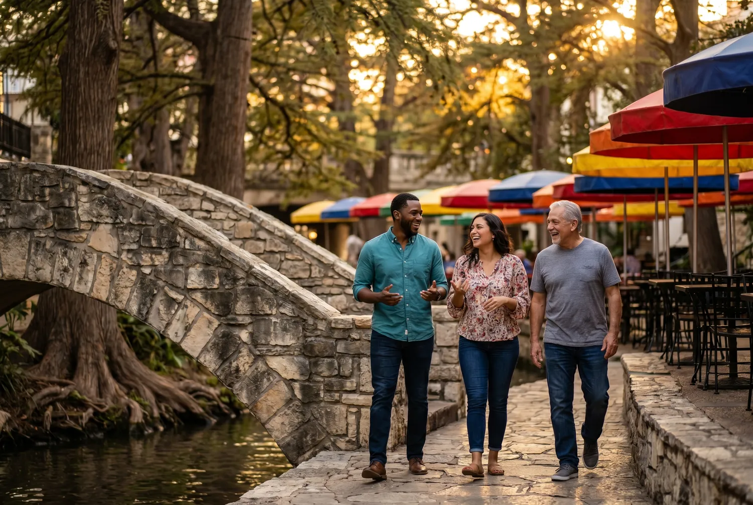 Friends strolling the San Antonio River Walk at evening Friends strolling the San Antonio River Walk at evening
