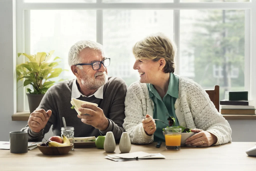 Couple at table smiling