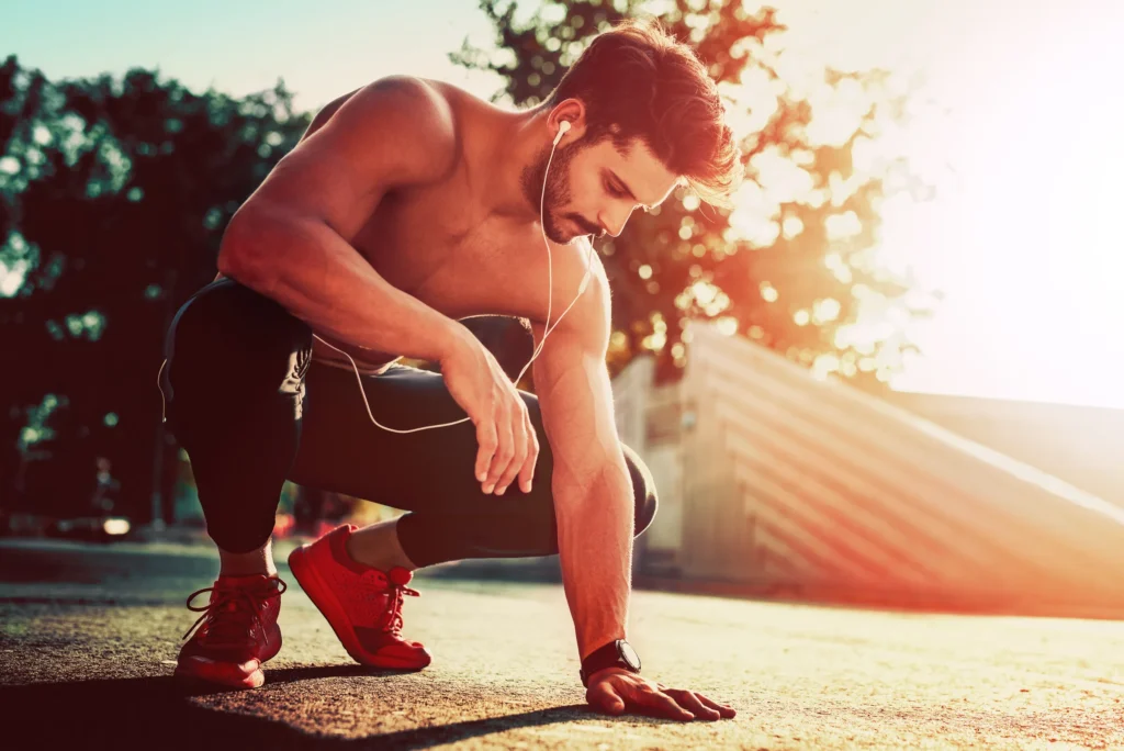 man stretching preparing for cardio exercise