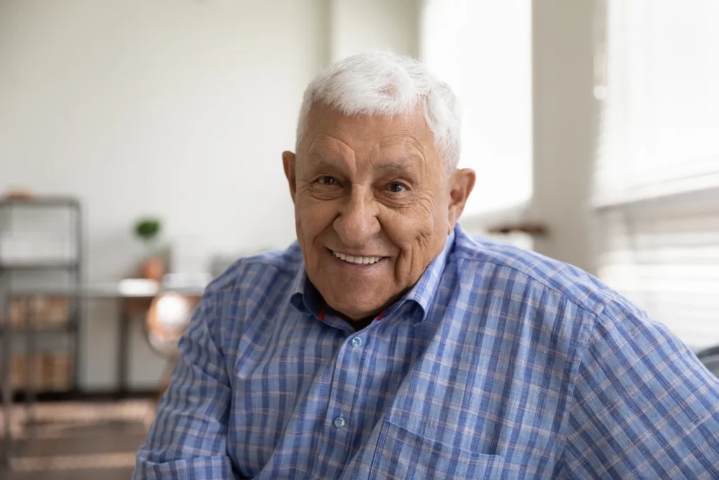 older man smiling